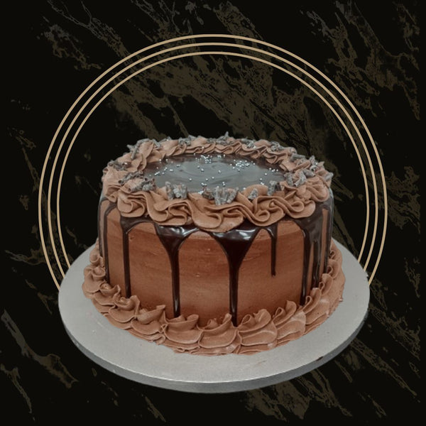 Petite chocolate cake with elegant design, perfect for individual servings from The Bakers Shop in Birmingham